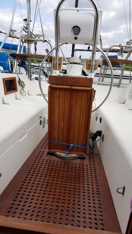 Recent new cockpit sole grate.Teak stowable folding table.