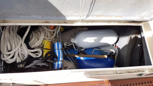 Deep cockpit stowage locker.