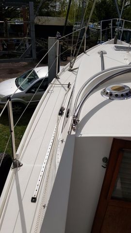 Wide safe side decks, high coamings.