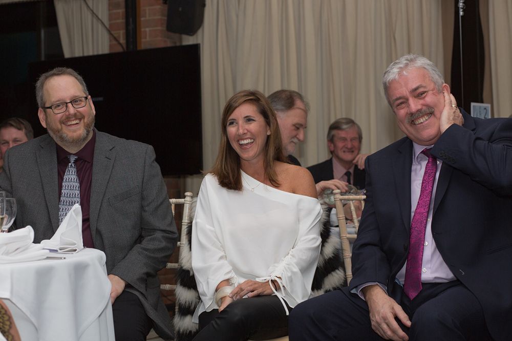 Courtney Chalmers (middle) and Ian Atkins at the presentation ceremony.