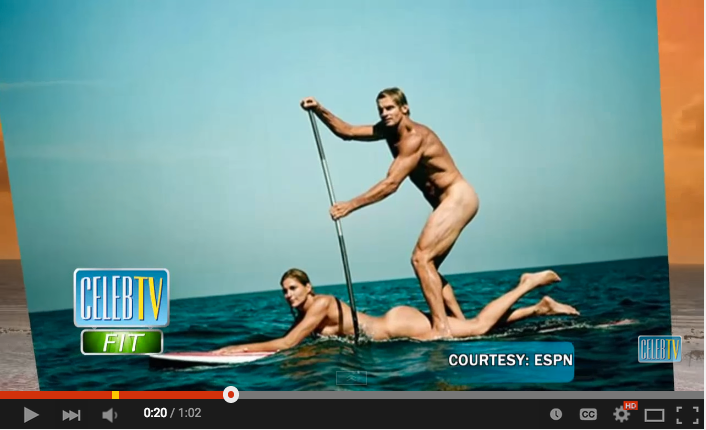 Naked stand up paddleboarding