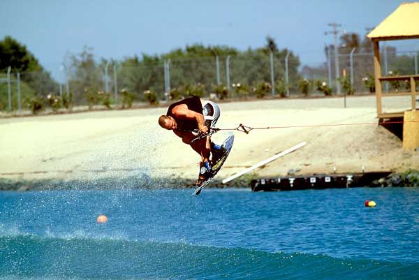 Once you're consistently clearing the wake, you can begin to learn tricks such as rail grabs and variations of them.