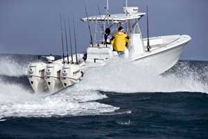 Triple Evinrude E-TEC 300 outboards pushed the SeaHunter Tournament 35 to 68 mph. Best fuel economy is 1.3 mpg at 40 mph and 3500 rpm.