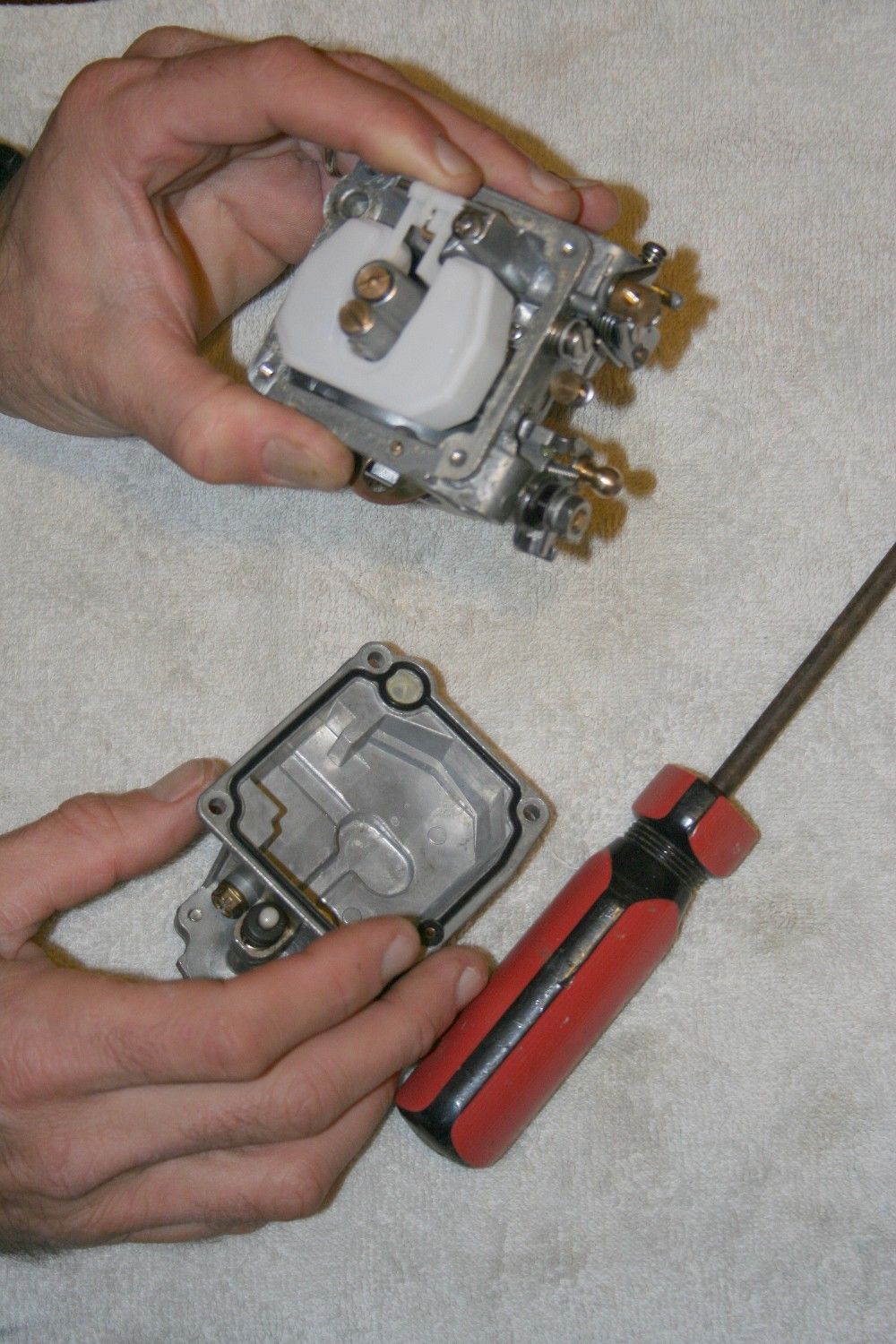 Rebuild carburetor with new parts
