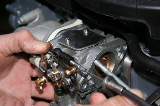 remove carburetor from an outboard