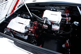 A collaboration between Teague Custom Marine and Whipple Industries, prototype 1,385-hp supercharged engines—matched to the boat’s color scheme—power the 43-footer.