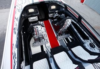 Shock absorbing buckets were specially fabricated for the boats’s sit-down cockpit.