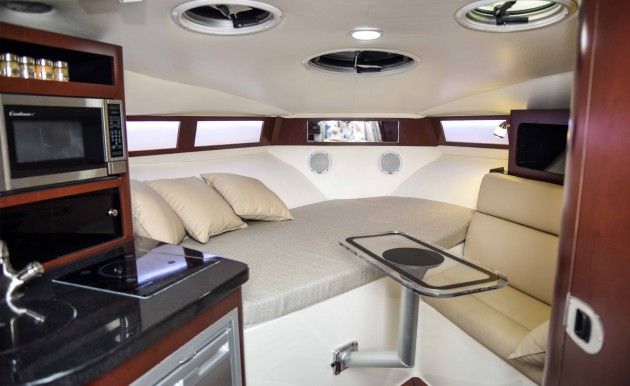 The interior on the Century 30 Express is warm, comfy, and has more features than you'd expect, on a boat this size.