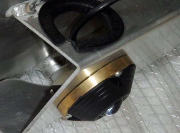 In this underwater light fixture, stainless steel screws connect dissimilar metals -- bronze and aluminum. In salt water, this is recipe for galvanic corrosion.