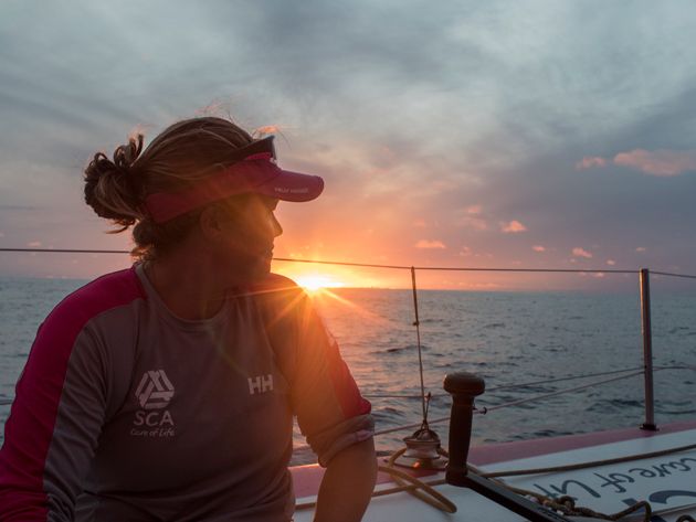 Watching sunset offshore sparks a rare moment of relaxation for Sally. Photo: Corinna Halloran/Team SCA/Volvo Ocean Race