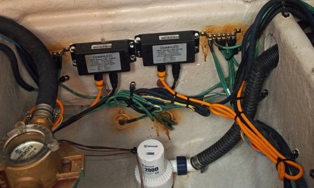 Despite the messy spray-job, the terminals on these underwater light fixtures are beiing protected.