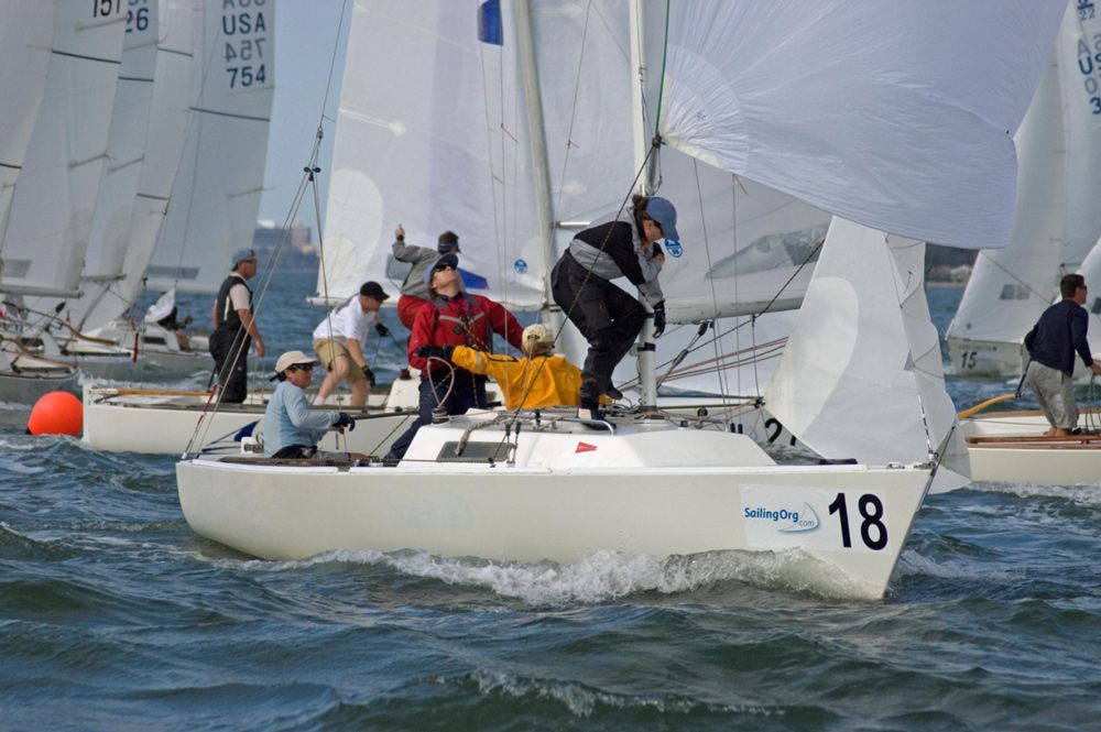 Our own boats.com editor Carol Cronin (seen here at the tiller) competes in regattas on Labor Day... and on Memorial Day, the Fourth of July, and oh heck, just about any time she's not in front of the computer.