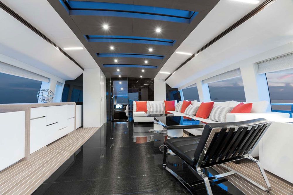 The skylounge offers a nice reprieve from the elements, be it heat, rain, or wind. Located between the helm and the aft terrace, this room offers 270-degree views and will be a favorite spot for many aboard.
