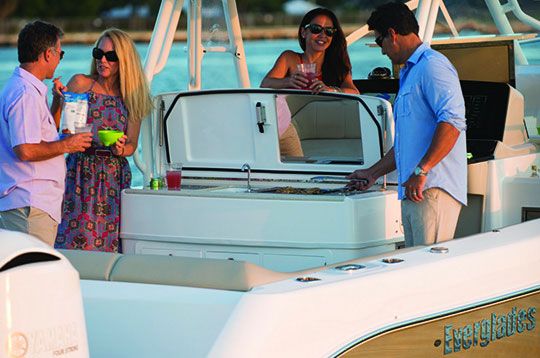 The rear half of the boat provides a 100-square-foot cockpit with a galley (one of two aboard) and another lounge. And oh yeah, the fishing center.