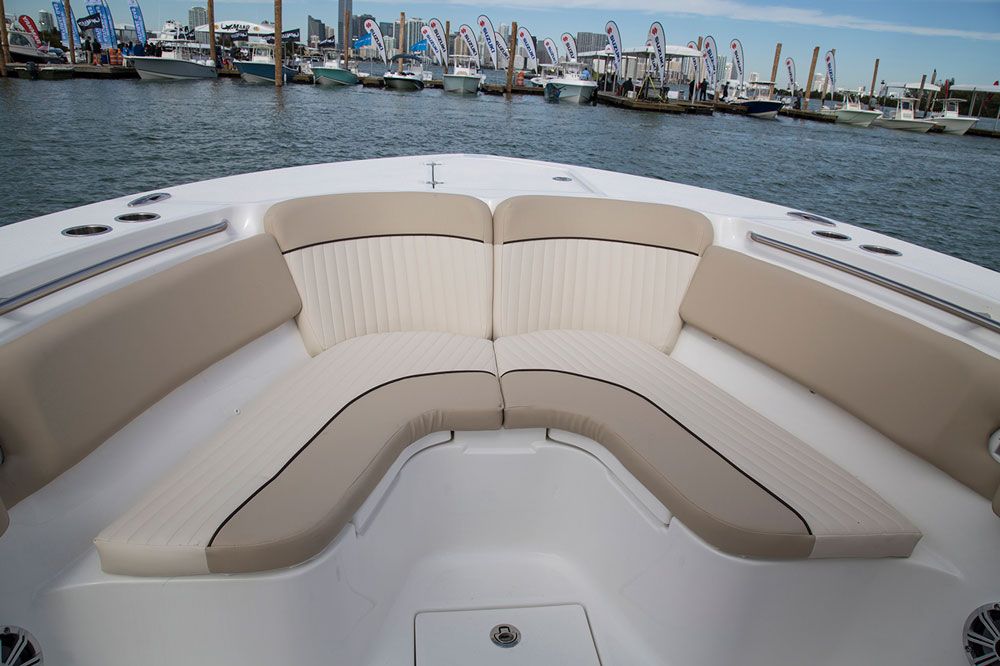 Twin pop-out backrests that stow flush under the gunwale can turn the starboard and port sides of the bow seating into forward-facing lounges.