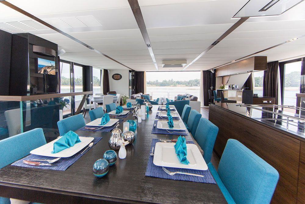 Although each interior is unique, the floor space accommodates a large lounge aft and dining seating for eight.