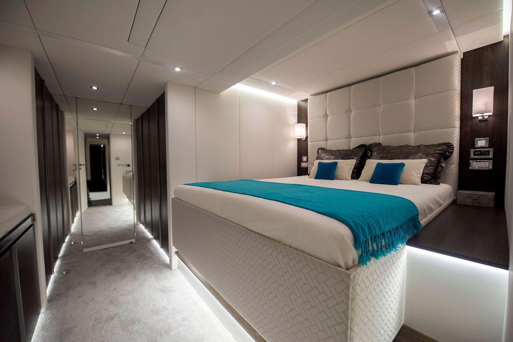 Sleeping accommodations are in four double cabins, each with an ensuite head. The owner’s stateroom is aft in the starboard hull and has an oversized bath, and all living quarters are accented with padded surfaces and carpeted cabin soles for sound attenuation.