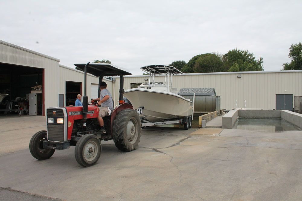 The 8,000 gallon test tanks have a depth of four feet, and are inclined so trailer boats can be easily backed into them.