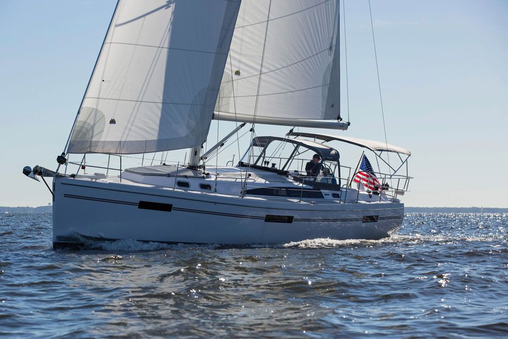 The traveler (and yes, Catalinas still have them to fine-tune sail shape) is on the cabin-top of the 425 with both control lines terminating at Lewmar rope clutches on the port side, so you can reach both without moving.