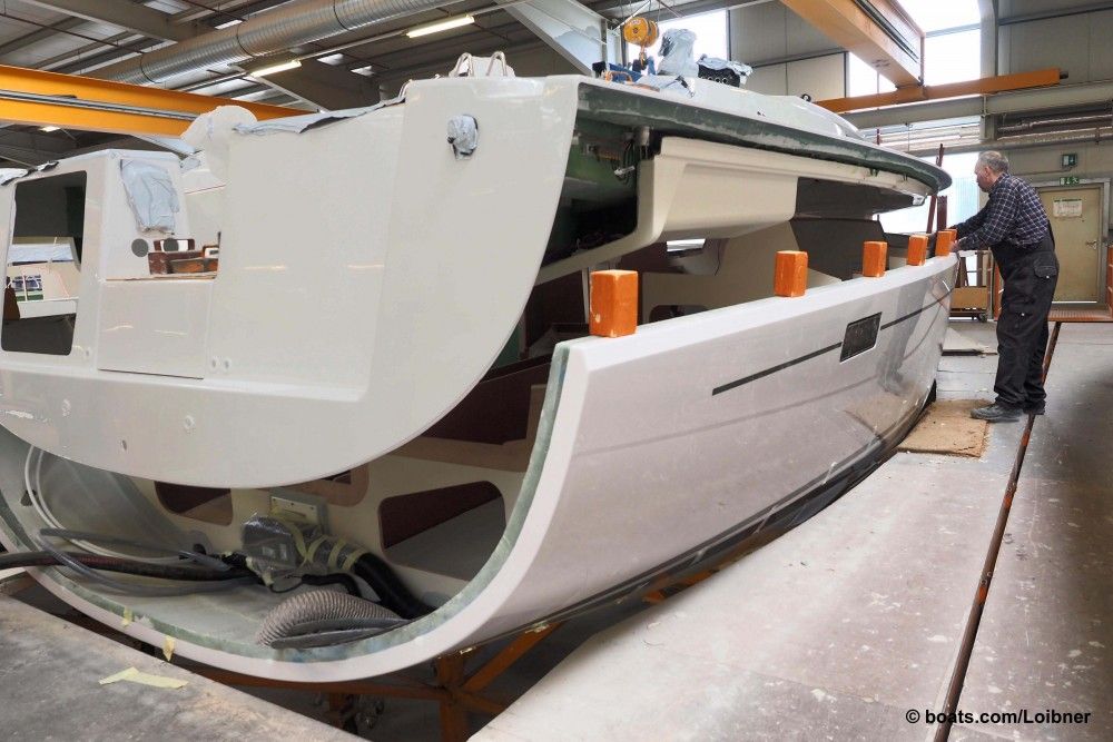 Once the interior is completely installed the deck is fitted to Hanse’s sailing yachts. Photo by Dieter Loibner.