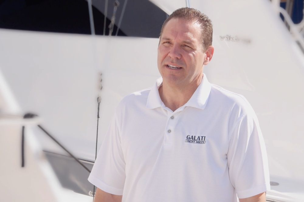 Darren Plymale, Galati Yacht Sales COO, describes the company's marketing approach standing amidst a row of Vikings, one of its flagship brands. Ed Kukla photo