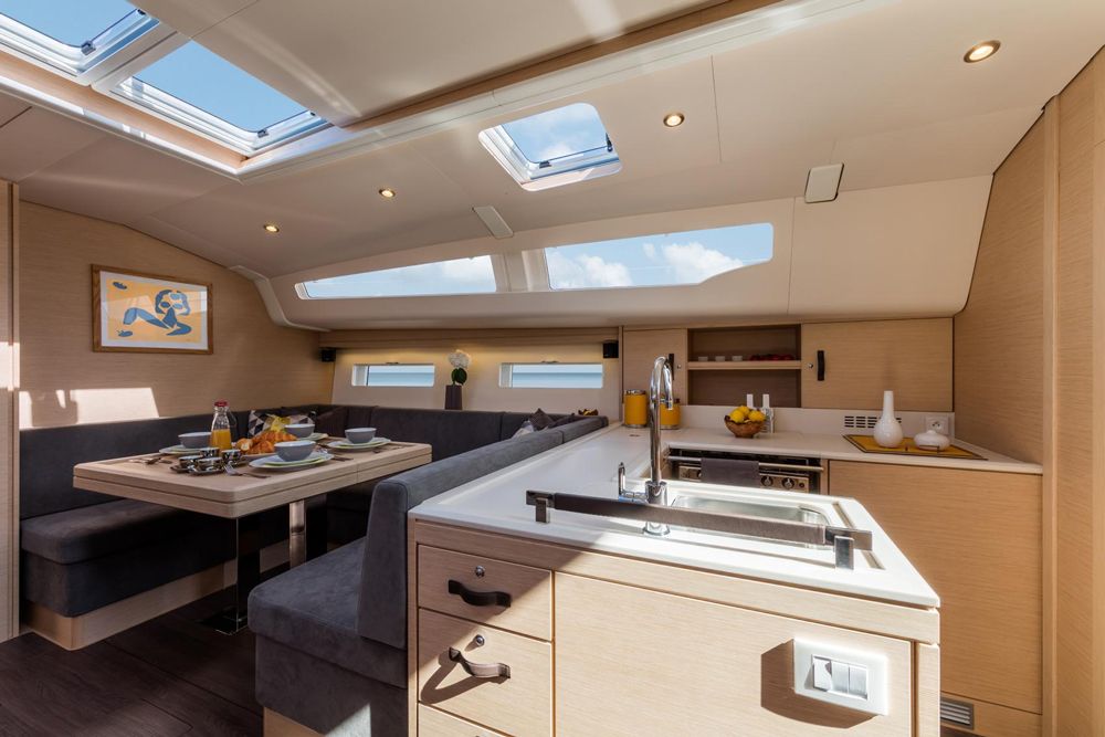 The galley is large with generous Corian countertop space, an Eno three-burner stove, a Vigtrifrigo fridge, sinks on the centerline and an optional freezer. The only complaint here is that the galley is one small step down and until you get used to that, it makes a tripping hazard.