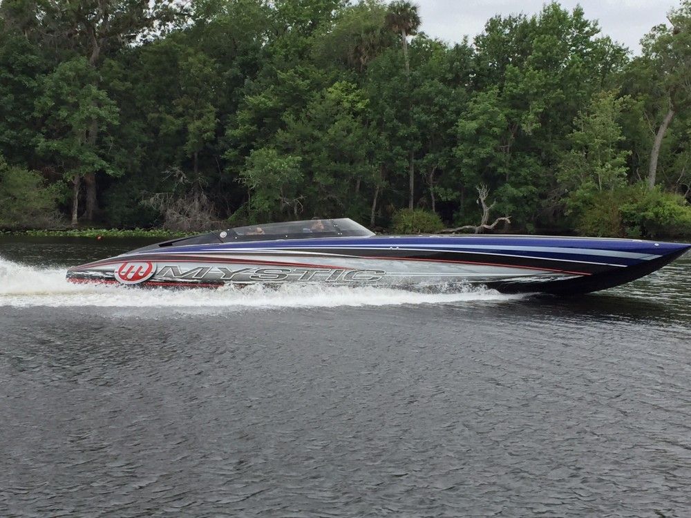 With its lowered deck, this new Mystic C4400 could be the most attractive go-fast pleasure catamaran the company has ever built. Photo by Scott Sjogren/Mystic Powerboat Sales.