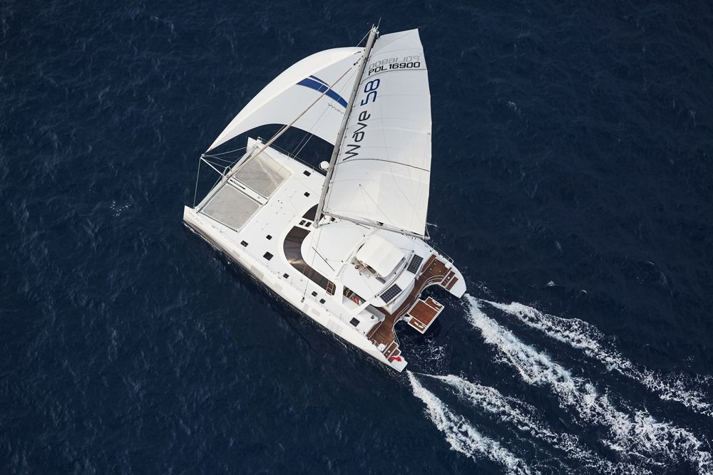 Almost everything about the Wave 58 is different. From the rounded hulls, to the reordered interior layout, to the use of deck and cockpit space, the Wave makes its own statement.
