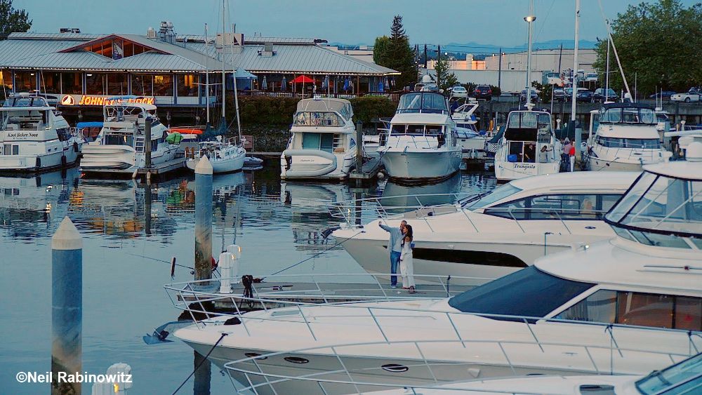 Even when the destination is in a city marina, there's always room for quiet conversation and a selfie. Neil Rabinowitz photo.