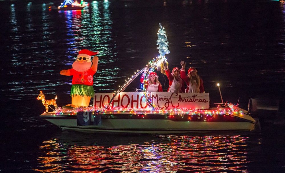 Accompanied by three of his helpers and led by his faithful reindeer, Rudolph, it looks like this Santa is ready for an island Christmas