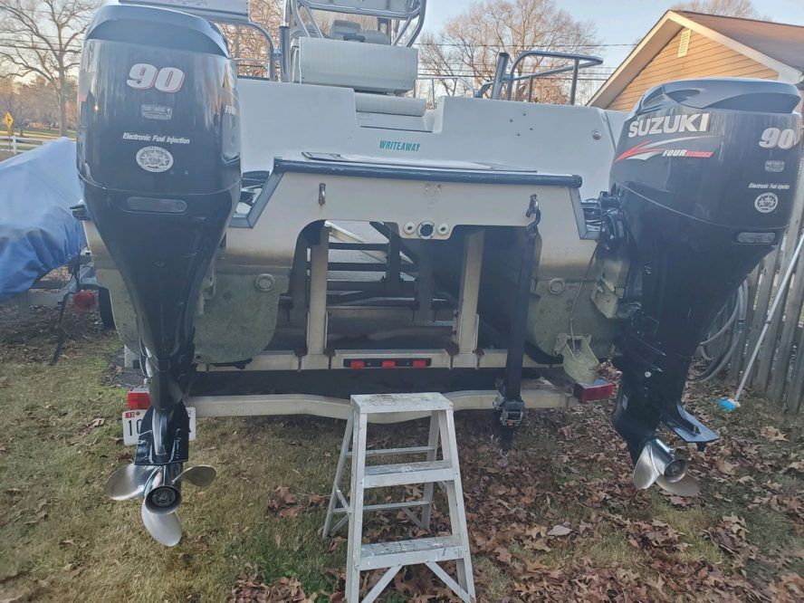 boat wth the outboards tilted down