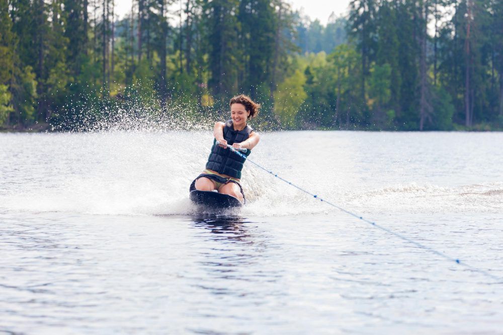 woman riding kneeboard