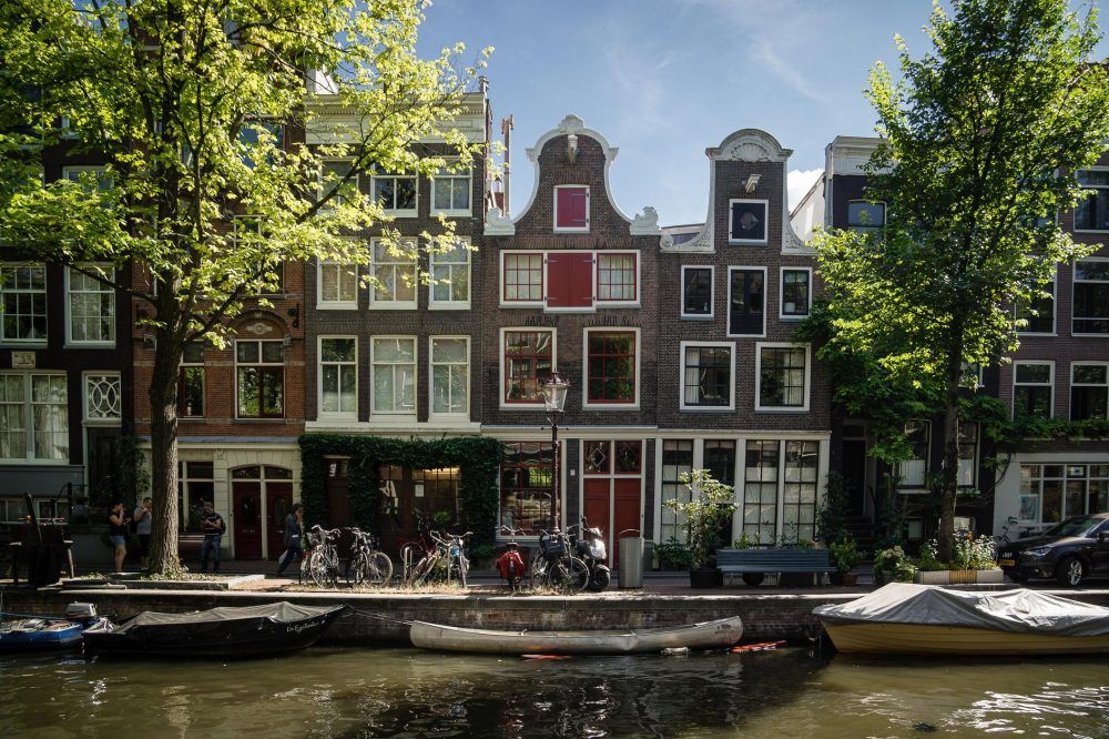 Netherlands Amsterdam buildings houses architecture canal Holland river