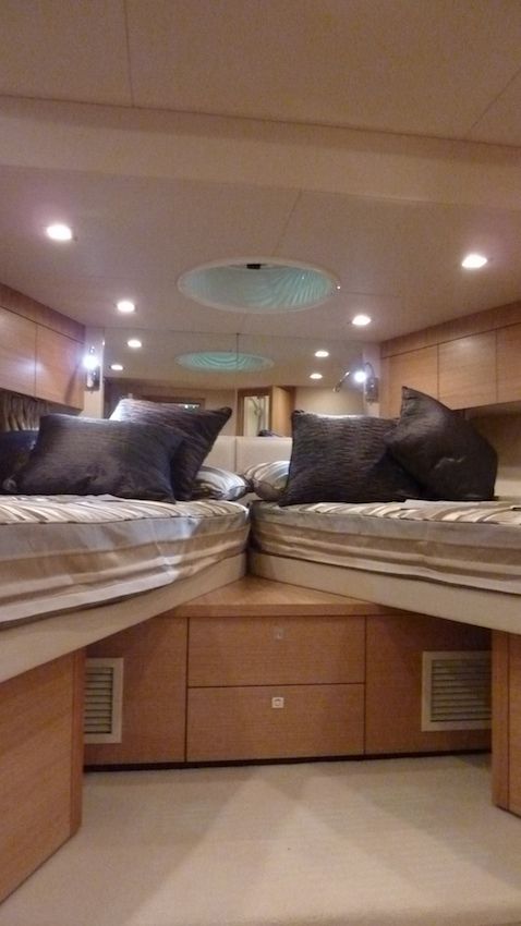 portofino-48-9212 The V-berth forward can swing apart as two singles or together as a double.