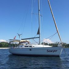 Jeanneau SO 37 2004 Jeanneau SO 37 sailboat named Sawyer on calm water.