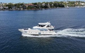 Azimut 75 Azimut 75 yacht cruising on a serene waterway, 2006 model.