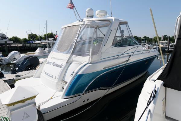 Formula 37 PC 2006 Formula 37 PC yacht docked at marina, featuring sleek design and blue accents.
