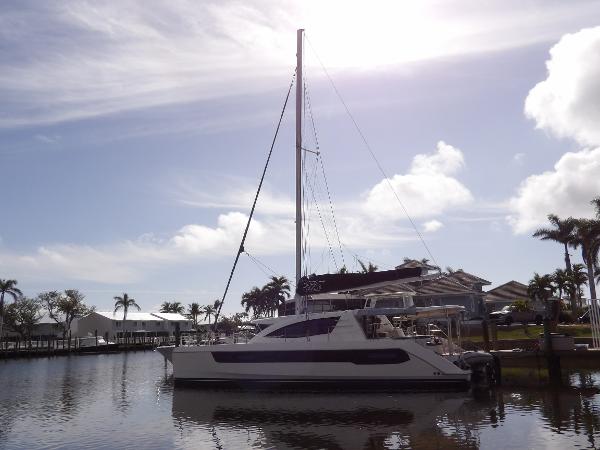 Leopard 48 Leopard 48 catamaran docked in sunny marina, 2014 model.