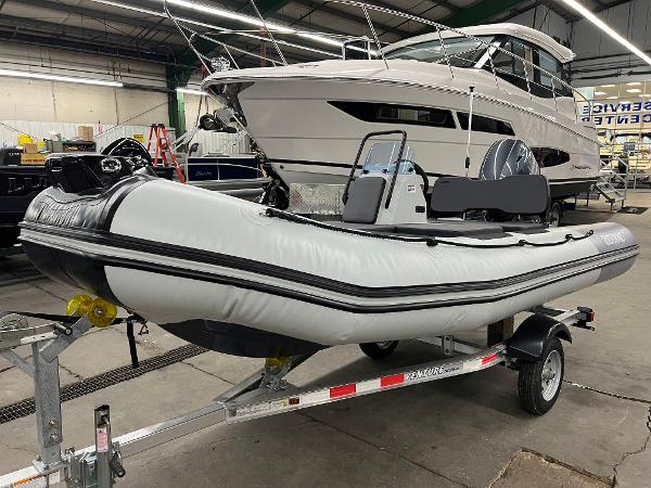 Zodiac Open 4.2 2023 Zodiac Open 4.2 inflatable boat on trailer in showroom.