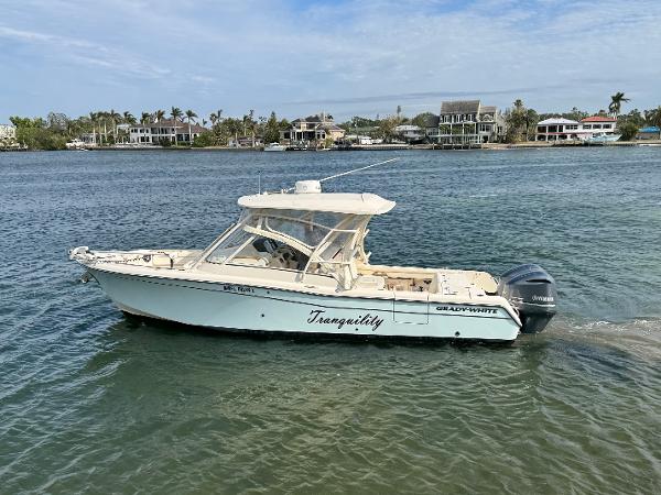 Grady-White Freedom 285 2021 Grady-White Freedom 285 boat named Tranquility on calm water.