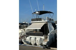 Jeanneau Merry Fisher 1295 Fly 2023 Jeanneau Merry Fisher 1295 Fly yacht docked with triple Yamaha engines.