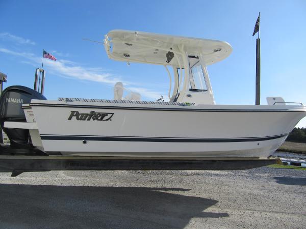 Parker 2200 Center Console 2025 Parker 2200 Center Console boat on trailer, clear sky background.