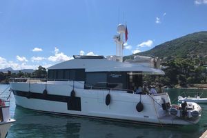 Sundeck Yachts 580 Luxury 2020 Sundeck Yachts 580 moored in scenic coastal waters.