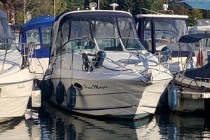 Doral 250 SE 2001 Doral 250 SE boat named "Pure Magic" docked among other vessels.