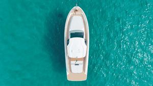 Solaris Power 40 open 2024 Solaris Power 40 Open yacht on turquoise water, aerial view.