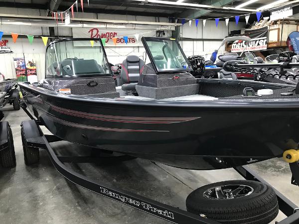 Ranger VS1782SC Angler 2024 Ranger VS1782SC Angler boat displayed in showroom with trailer.