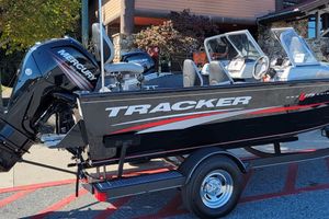 Tracker Pro Guide V-175 Combo 2019 Tracker Pro Guide V-175 Combo boat with Mercury engine on trailer.