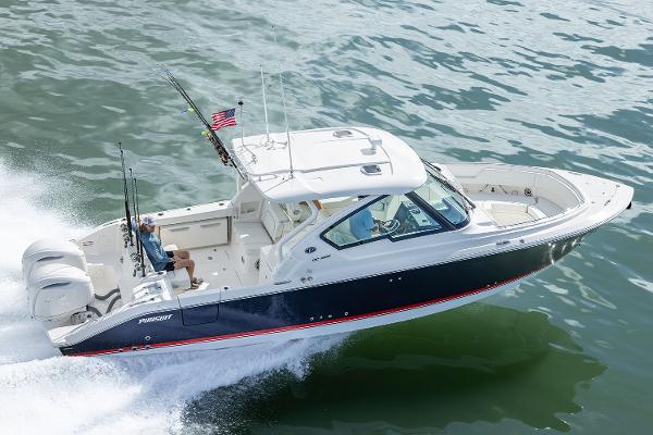 Pursuit DC 326 Dual Console Manufacturer Provided Image: 2025 Pursuit DC 326 Dual Console boat cruising on open water.