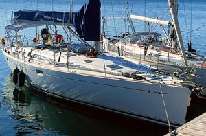 Jeanneau Sun Odyssey 49 2004 Jeanneau Sun Odyssey 49 sailboat docked in calm waters.