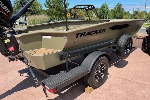 Tracker Grizzly 1650 T Prairie Wings Edition 2026 Tracker Grizzly 1650 T Prairie Wings Edition boat on trailer, outdoors.